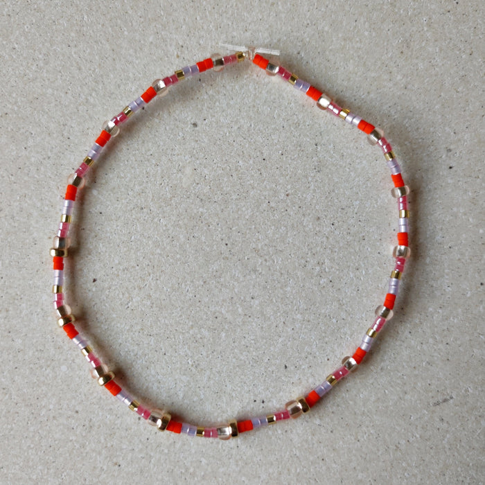 Natali Smykker Smykker Fargemix orange/lilla/gull Natali- Armbånd m/miniperler på strikktråd kunstkolonialen