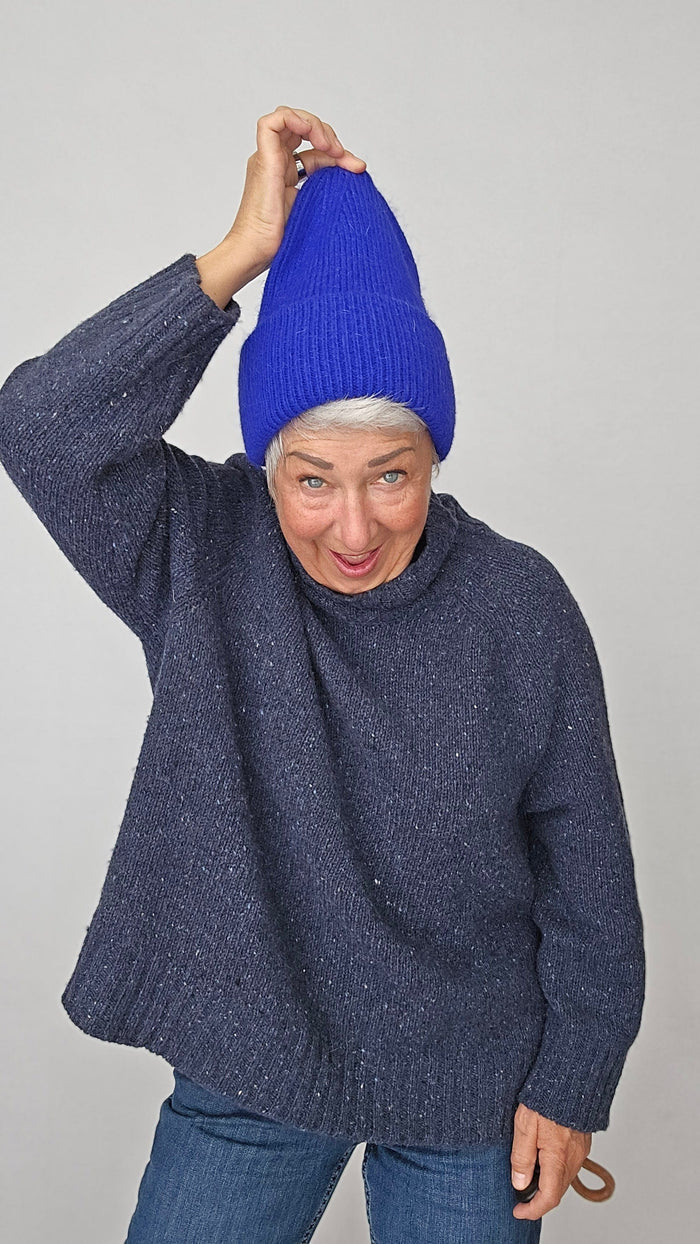 Kvitfjell Lue Kvitfjell- Lue i angora kunstkolonialen