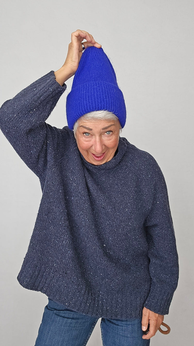 Kvitfjell Lue Kvitfjell- Lue i angora kunstkolonialen